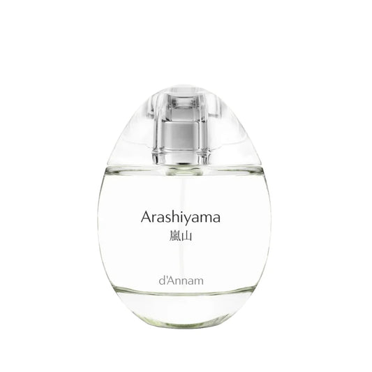 Clear, egg-shaped bottle labeled 'Arashiyama d'Annam' on a white background.