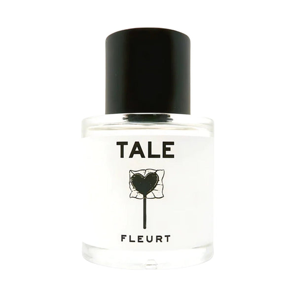 Bottle of Fleurt by Tale Parfum with a black top on a white background