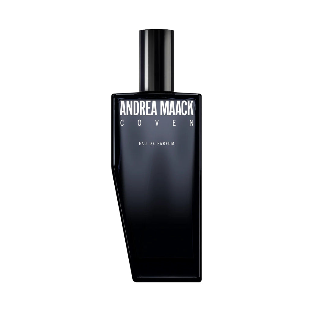 Black perfume bottle labeled 'Andrea Maack Coven' on a white background
