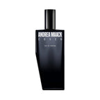 Black perfume bottle labeled 'Andrea Maack Coven' on a white background