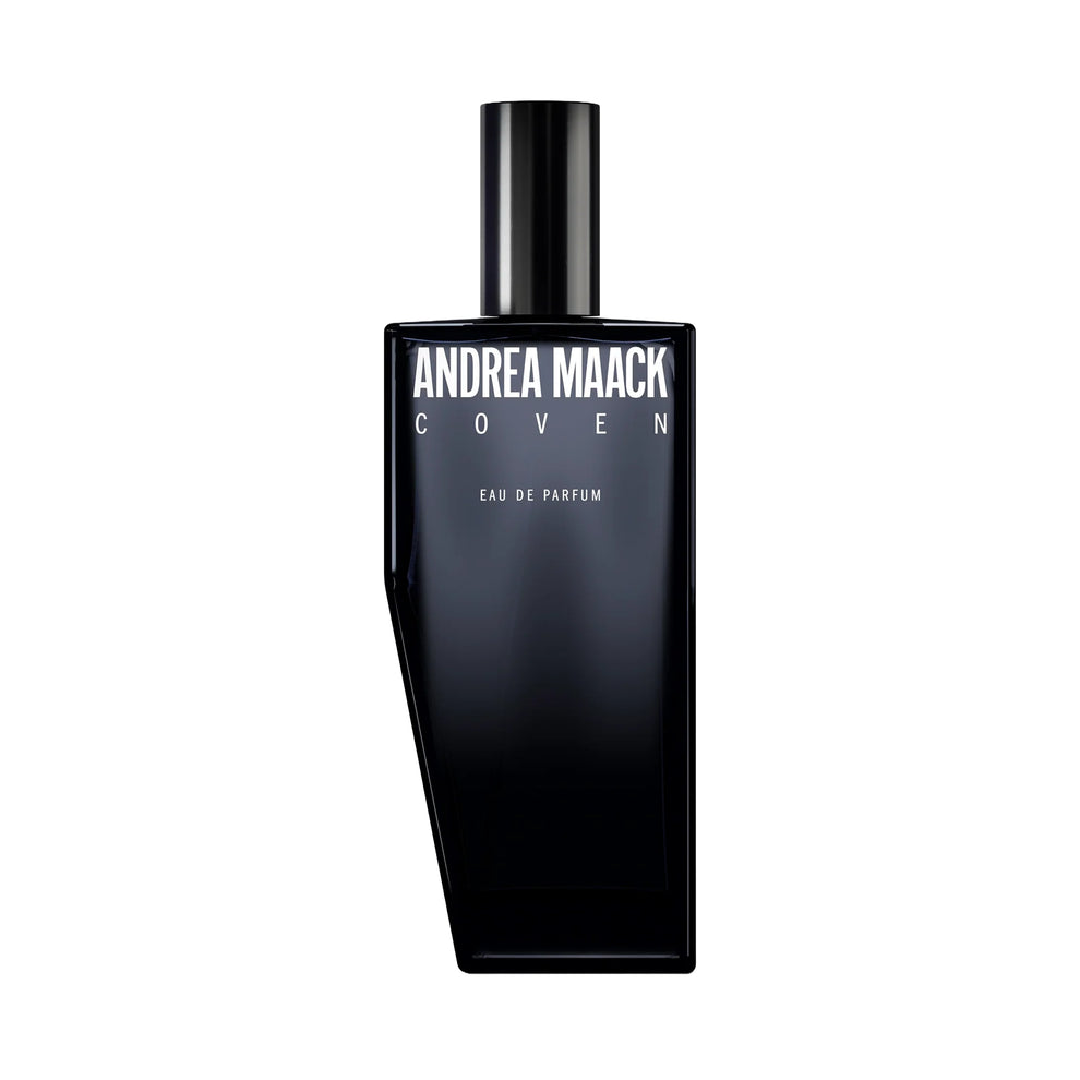 Black perfume bottle labeled 'Andrea Maack Coven' on a white background 