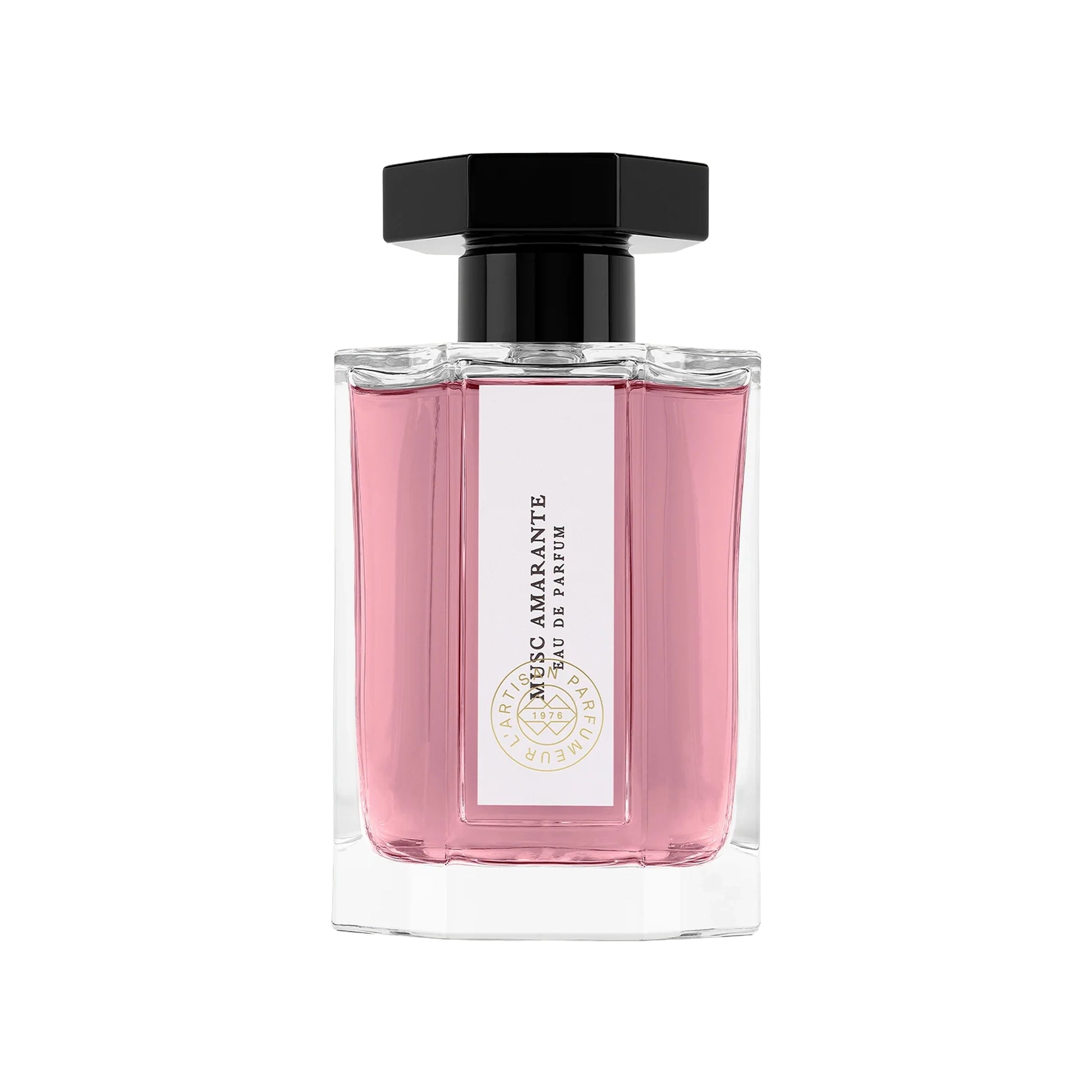 Pink perfume bottle with a white label, pink liquid and black cap on a white background